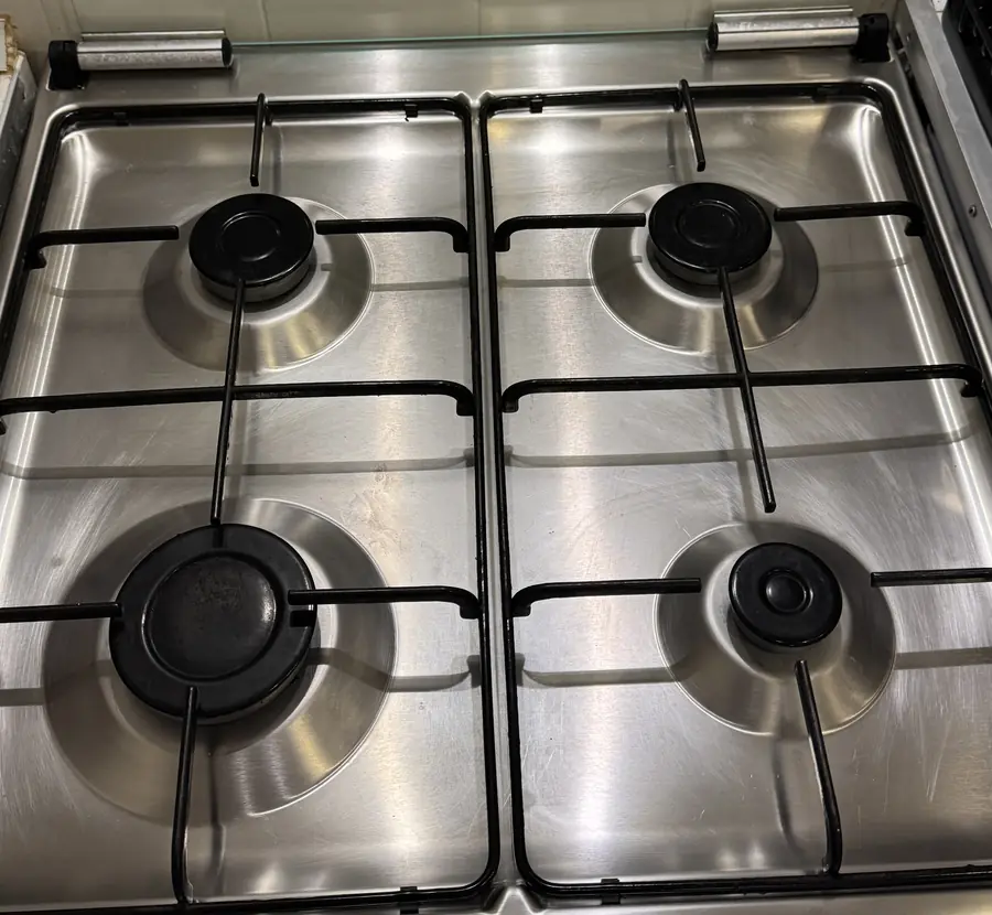 Stainless steel gas hob after cleaning