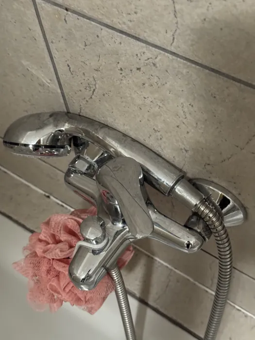 Chrome shower mixer and tiling descaled after cleaning